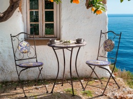 Beliani Stolik bistro CORIANO metalowy z ceramicznym blatem 60 cm czarny