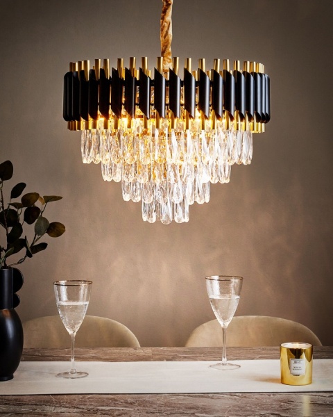 Elegancki Żyrandol Beliani ABELLAS w Stylu Glamour - Złoty Metal z Czarnymi Akcentami i Szklanymi Kryształkami Elegancki Żyrandol Beliani ABELLAS w Stylu Glamour - Złoty Metal z Czarnymi Akcentami i Szklanymi Kryształkami